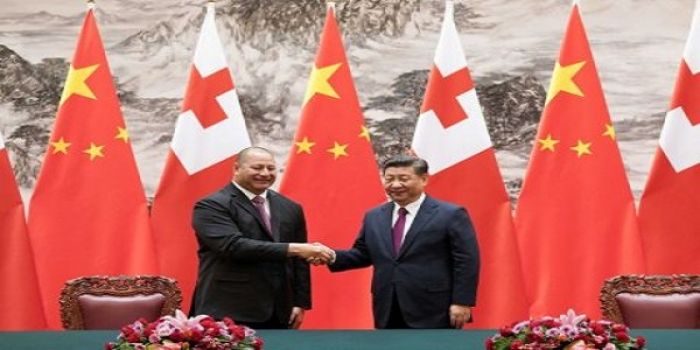 Tonga&#039;s King Tupou VI shakes hands with China&#039;s President Xi Jinping at a meeting earlier this year