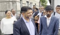 Aiyaz Sayed-Khaiyum, middle, outside the Government Buildings in suva on Tuesday