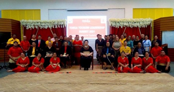 sitting on the ground - staff of the Tonga Tourism Authority, left to right on seats – Mr. Sione Moala Mafi (CEO, Ministry of Tourism), Ms. Mishka Tu’ifua (Chairlady, Tonga Tourism Authority Board), Mr. Viliami Takau (GM Tonga Tourism Authority), HRH Salote Mafile’o Pilolevu Tuita (Patron, Tonga Tourism Association and Guest of Honour), Hon. Rev. Dr. Pohiva Tu’i’onetoa (Prime Minister / Acting Minister for Tourism / Chairman of the Tourism Leaders Summit), Hon. Frederica Lupe&#039;uluiva Fatafehi &#039;o Lapaha Tuita Filipe (Principal Tourist Officer, Ministry of Tourism), Mr. Siosaia Moehau (President, Tonga Tourism Association) standing - Directors of Tourism Board, Business Leaders/Executive Members of the Tonga Tourist Association, Staff of Ministry of Tourism Senior Managers