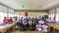 Mary Jane Kivalu (sitting on the floor at left) with the University of Otago delegation at Takuilau College in Lapaha, Tonga Mary Jane Kivalu (sitting on the floor at left) with the University of Otago delegation at Takuilau College in Lapaha, Tonga Photo: Dr Mele Taumoepeau