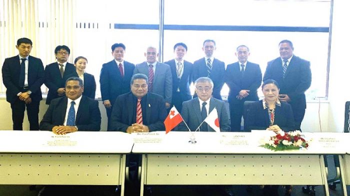 After the Bid Opening, front row from left: Mr. Paula Ma&#039;u, Hon. Poasi Tei, Mr. Tanaka and HE Lady Tania Fusitu&#039;a. Standing behind the Hon. Minister is Mr. Feleti Tu&#039;ihalamaka with Solomone Finau at far right and the rest of the Japanese delegation.