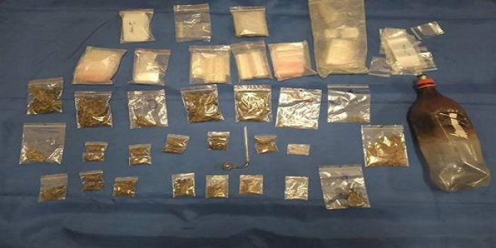 Five arrested and charged with possession of illicit drugs