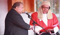 Nauru Chief Justice Ratu Joni Madraiwiwi (right) swears in President Baron Waqa (left) in July 2016. Photo: Republic of Nauru Government