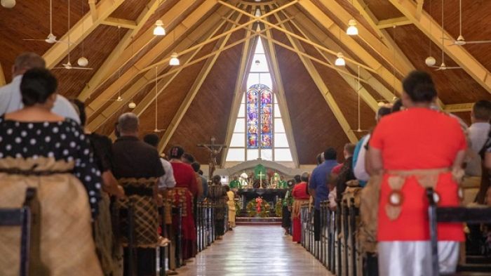 Tongans gather at The Cathedral of St Mary in Nuku&#039;alofa to commemorate the one year anniversary of the eruption and tsunami. Photo: RNZ / Angus Dreaver