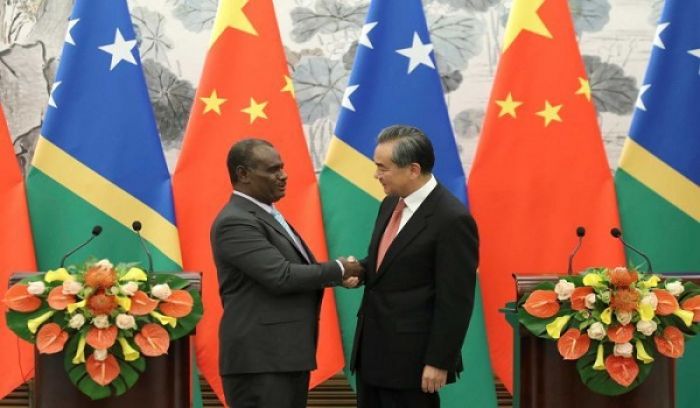 Solomon Islands Foreign Minister Jeremiah Manele travel to Beijing to formally establish to diplomatic ties on September 2019