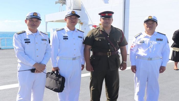 Dr. James Latu of His Majesty&#039;s Armed Forces with his former teachers