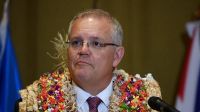 Prime Minister Scott Morrison, pictured in Fiji last year. Australia has kept all essential personnel in the South Pacific and its posts remain open