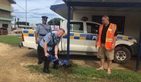 Tonga Police Commissioner Stephen Caldwell with Tevita Puloka